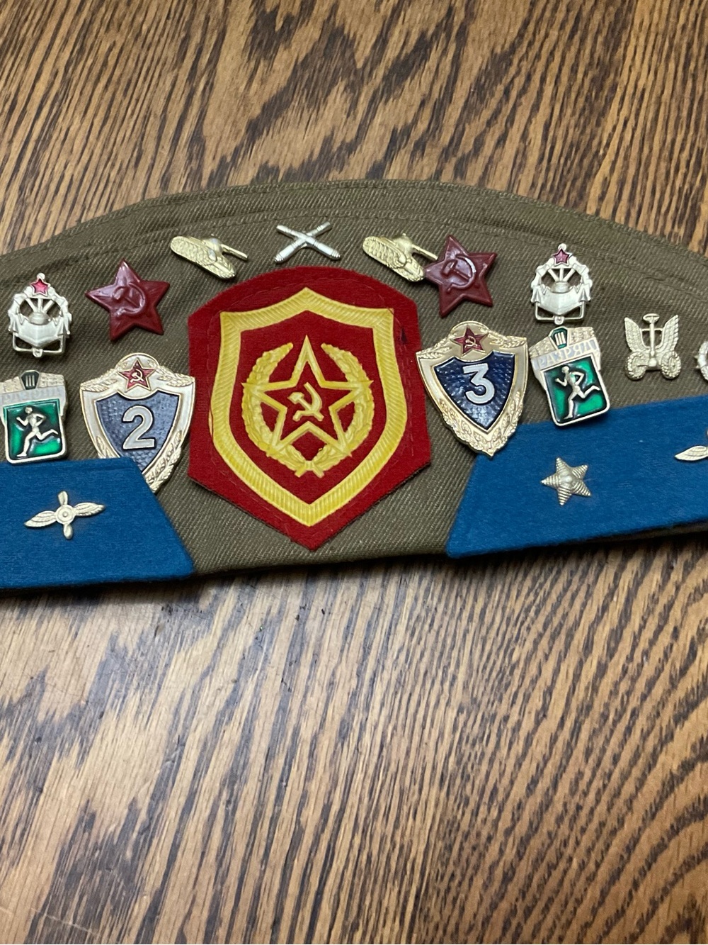 7-2026–Military Style Olive Green Badge Cap with Red and Blue Accents